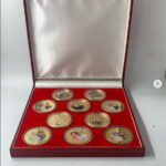Antique Collectible Coins With Queen Elizabeth & Philip With Red Cusion Boxes