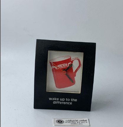 ساعة طاولة ومنبه من دعيات نسكفيه قديمة